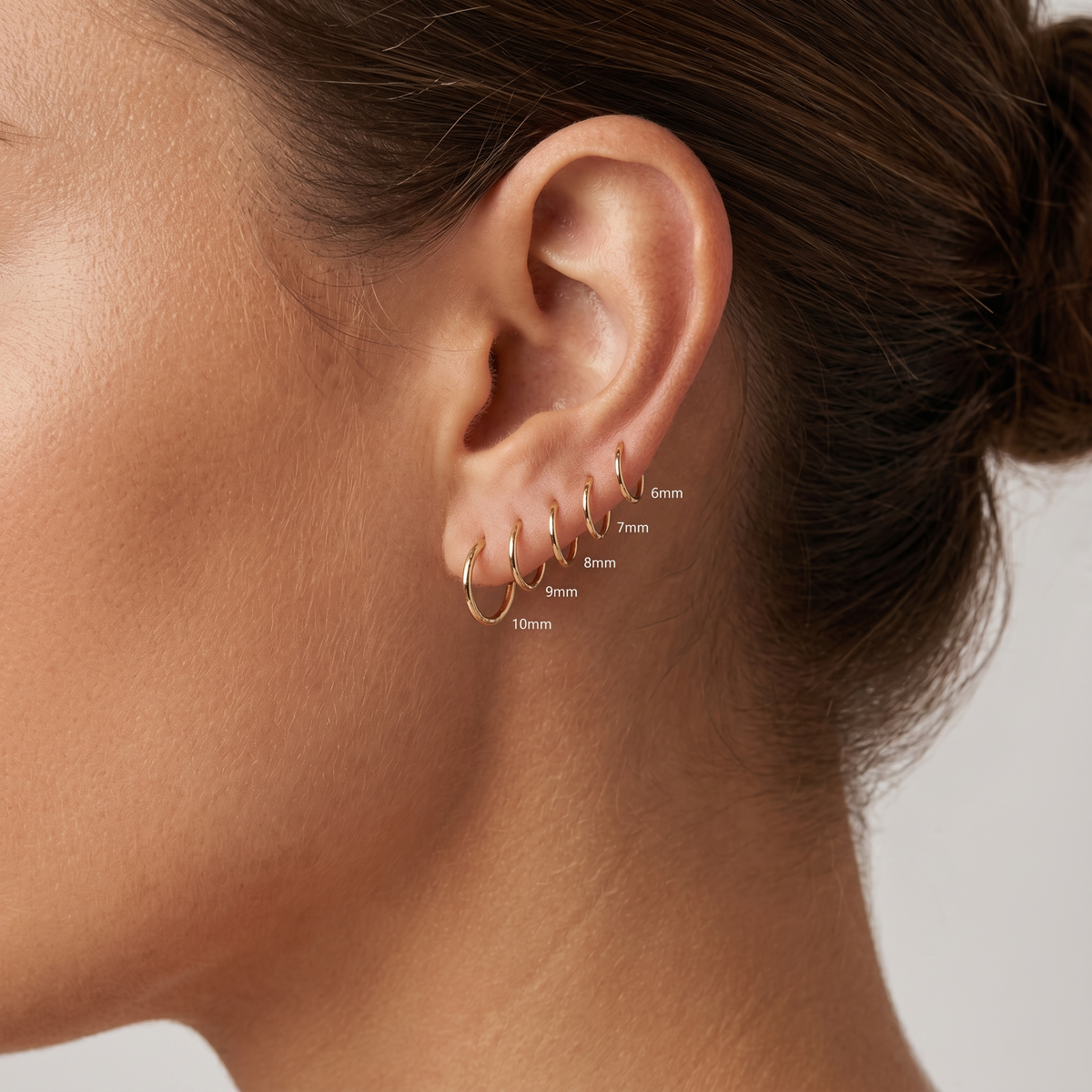 14K massivt guld mini klik-ørering 7mm
