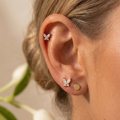 Boucle d'oreille à plat en forme de papillon scintillant